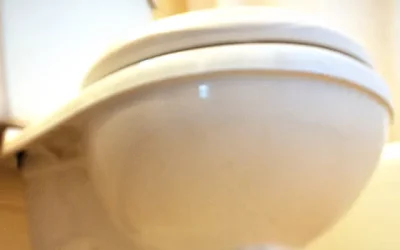 How do you unclog a toilet fast when the bowl is full?